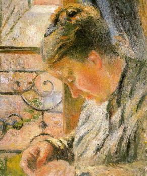 Camille Pissarro : Portrait of Madame Pissarro Sewing near a Window